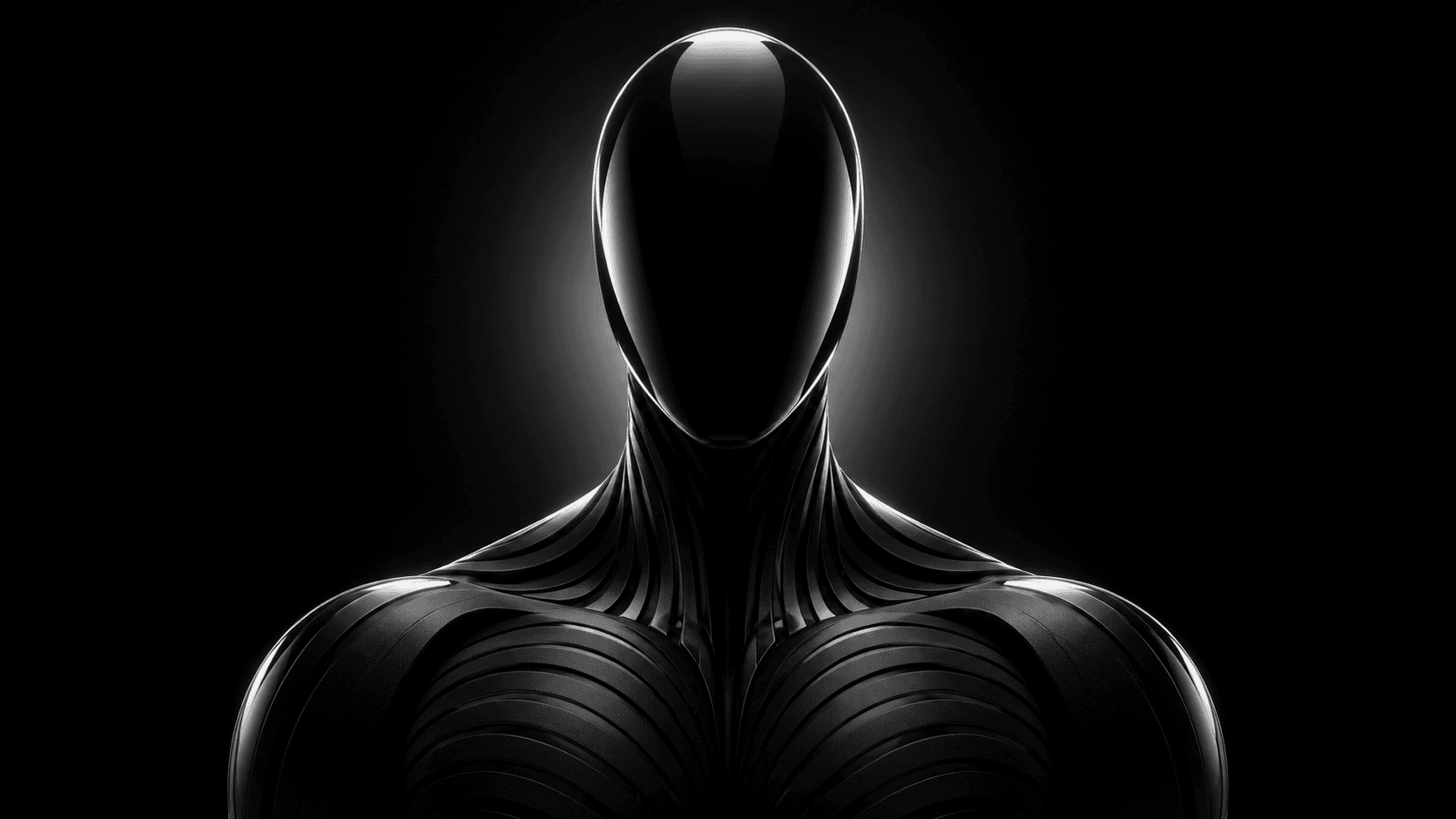 Faceless graphite sculpture, illuminated by a silver halo